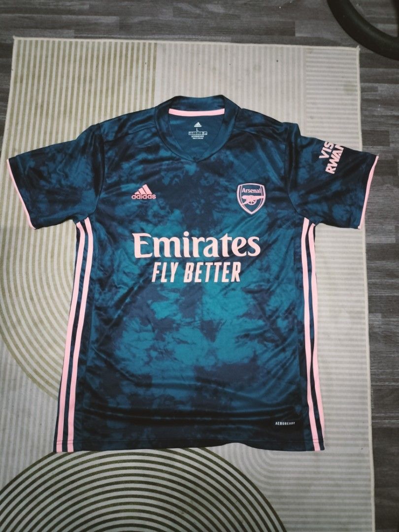 2020-21 Arsenal third shirt (Category: Activewear) located in Manila. Submitted by cyn.declutters (Listing ID 1466632106, Image 1). Description: dark blue and light blue tie dye shirt marble pattern w pink accent size Large made in thailand.