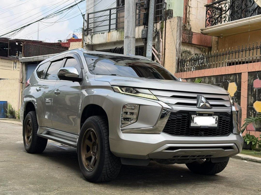 2021 Mitsubishi Montero GLS (Category: Other Automotive Parts and Accessories) located in Las Pinas. Submitted by cnp2021 (Listing ID 1466717995, Image 1). Description: 2021 Mitsubishi Montero GLS 2.4L Diesel Automatic Transmission (Paddle Shifter) 51T Mileage Sterling Silver Metallic 4x2 Push Start Smart Entry Power Retractable Sidemirrors Electronic Parking Brake Auto Brake Hold Leather Seatcover All Led Lights 360 Camera Drl 18s Te37 Mags with