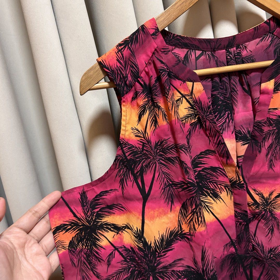 2XL Plus Size Sunset Palm Tree Print Sleeveless Top (Category: Sleeveless) located in Rizal. Submitted by from99abovecloset (Listing ID 1466615252, Image 2). Description: CODE:113 Size: 2XL Armhole (laid flat):11” Bust (around): 56” Length (laid flat): 28” Soft poly | loose | like new.