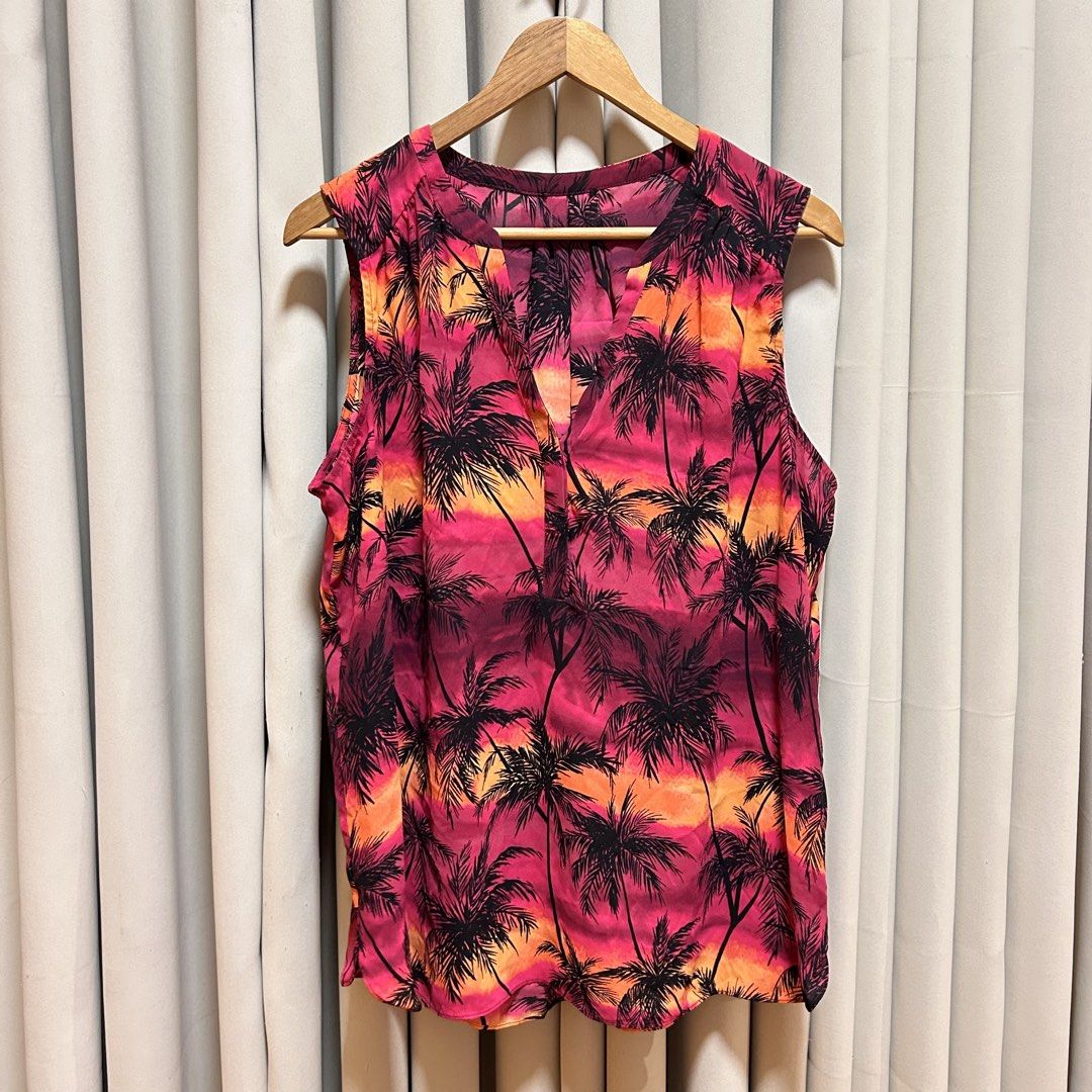 2XL Plus Size Sunset Palm Tree Print Sleeveless Top (Category: Sleeveless) located in Rizal. Submitted by from99abovecloset (Listing ID 1466615252, Image 1). Description: CODE:113 Size: 2XL Armhole (laid flat):11” Bust (around): 56” Length (laid flat): 28” Soft poly | loose | like new.