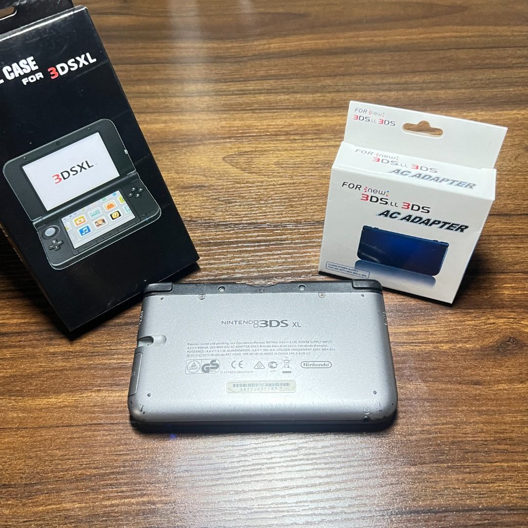 3DS XL Silver (Category: Nintendo) located in Caloocan City. Submitted by fiercetiger_f65bc9 (Listing ID 1466685475, Image 3). Description: 3DS XL Silver Price: 8700 Good condition ang mga buttons saka yung Circle pad, makinis pa yung screen. Signs of usage. Price is negotiable. Inclusions : - Stylus - Sandisk 32GB SD card (Original) - Charger - Crystal case LBC Lalamove ( Strictly Payment first ) Meetup locations : SM Manila, Robinsons Manila.