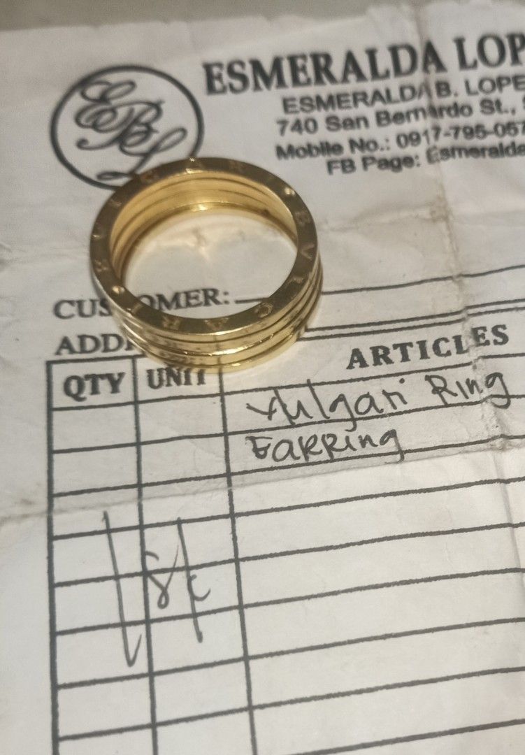 6100/gram only! Bvlgari 18K Gold Ring (Category: Jewelry) located in Pasay City. Submitted by _ladybags (Listing ID 1466772515, Image 1). Description: - Metal: Solid 18K Yellow Gold - Design: Classic Bvlgari multi-band spiral with iconic outer rim logo engravings - Weight: 7.13 grams - Condition: Minor defect due to previous handling, please check closeups. size 10 and 7.1* grams. Loc Tanza, Cavite..