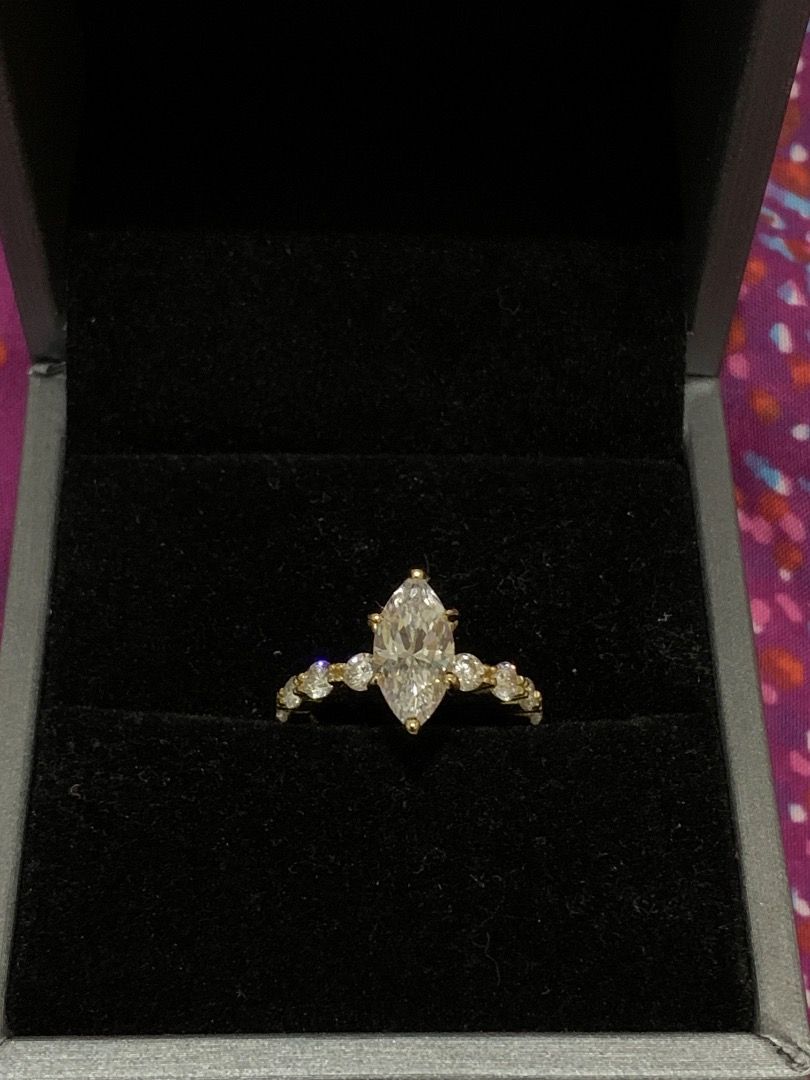 8A Grade CZ Marquise Cut S925 Ring (Category: Rings) located in Quezon City. Submitted by itscxyy (Listing ID 1466757565, Image 1). Description: - Ring Size: 5 - Material: Gold-plated S925 Sterling Silver (stamped on the interior band) - Design: High-setting Marquise-cut 8A grade cubic zirconia stone with accent round stones along the band - Condition: Brand new and sparkles brilliantly in the light - Perfect for: Daily wear, dates, engagement ri