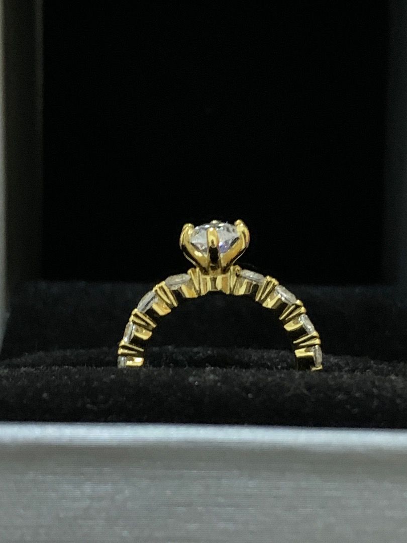 8A Grade CZ Marquise Cut S925 Ring (Category: Rings) located in Quezon City. Submitted by itscxyy (Listing ID 1466757565, Image 2). Description: - Ring Size: 5 - Material: Gold-plated S925 Sterling Silver (stamped on the interior band) - Design: High-setting Marquise-cut 8A grade cubic zirconia stone with accent round stones along the band - Condition: Brand new and sparkles brilliantly in the light - Perfect for: Daily wear, dates, engagement ri