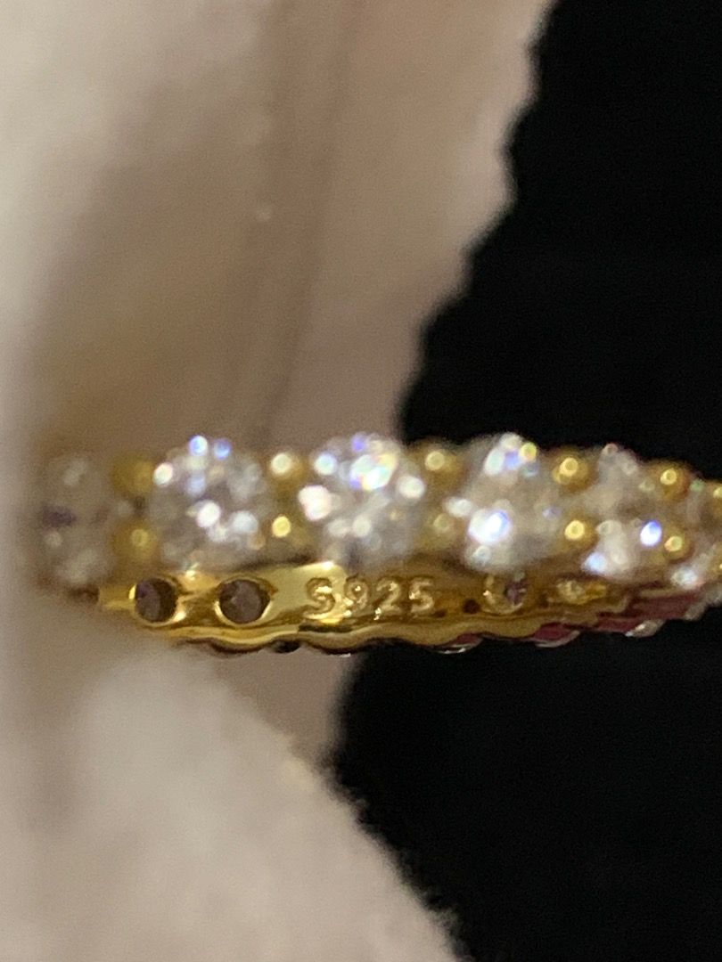 8A Grade CZ Gold-Plated S925 Full Eternity Ring (Category: Rings) located in Quezon City. Submitted by itscxyy (Listing ID 1466758329, Image 2). Description: - Material: Gold-plated with S925 stamp on inner band - Size 5 - Design: Classic full eternity band with 8A grade cubic zirconia stones - Versatility: Great for daily wear or stacking with other rings.