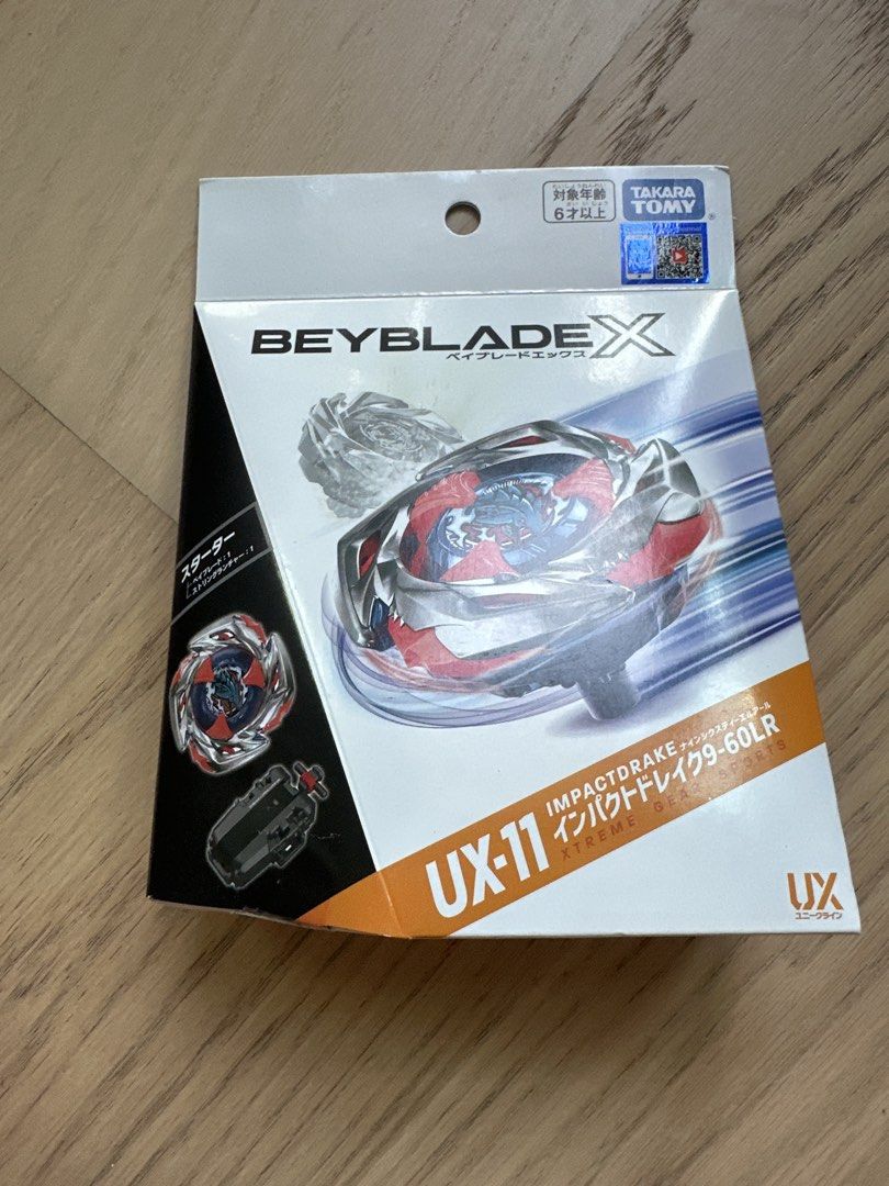 全新港版爆旋陀螺 Beyblade X UX-11 （分類：動作及對戰玩具）位於 Hong Kong。 由 wingsssssc 提交（商品編號 1466601482，圖片 1）。簡介： Takara Tomy Beyblade X UX-11 Impact Drake 9-60LR starter set. Includes the Impact Drake blade, 9-60 ratchet, and string launcher inside the original box. Japanese import. Great addition to any Beyblade collection for battles.。