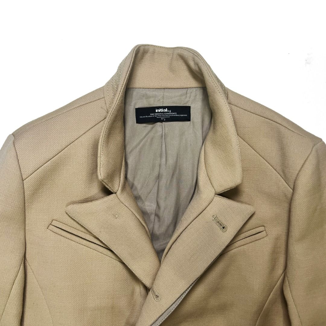 🟢 INITIAL Beige Wool Blend Structured Military Jacket Convertible Funnel Collar (Category: Coats, Jackets and Outerwear) located in Malabon City. Submitted by k.1006 (Listing ID 1466693154, Image 3). Description: 📝 Overview • INITIAL structured wool-blend jacket in a refined beige / camel-taupe tone • Featuring an unusually sculptural tailored construction that can be styled in several different ways. • Worn fully closed, it forms a clean funne