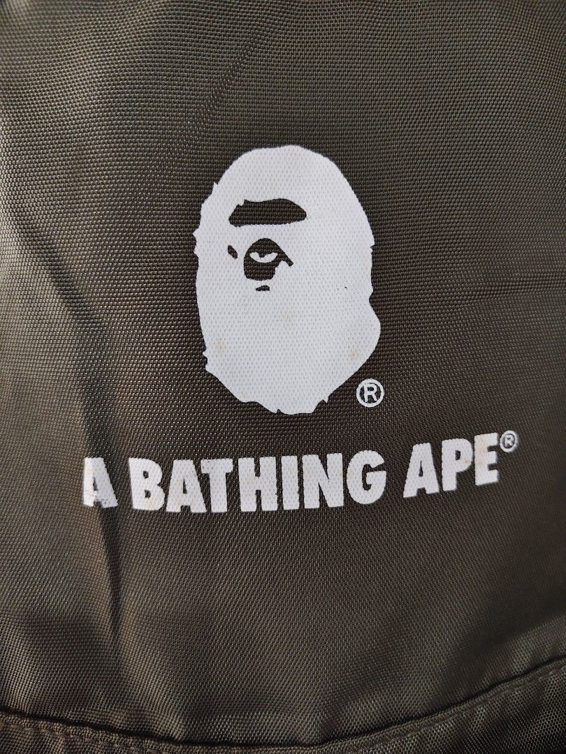 A Bathing ape (Bape) Olive Day Pack ( Authentic) (Category: Backpacks) located in Iloilo. Submitted by branded-boy0422_16 (Listing ID 1466566593, Image 3). Description: Authentic W: 15 L: 19 Good as new 10/10 Solid nito No Stain, Scratch, or pinhole.