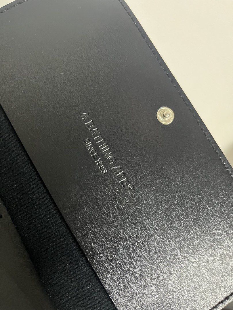 A BATHING APE Leather Multi-Case Black (Category: Luxury Bags & Wallets) located in Manila. Submitted by merryjoyan39637 (Listing ID 1466701315, Image 3). Description: .