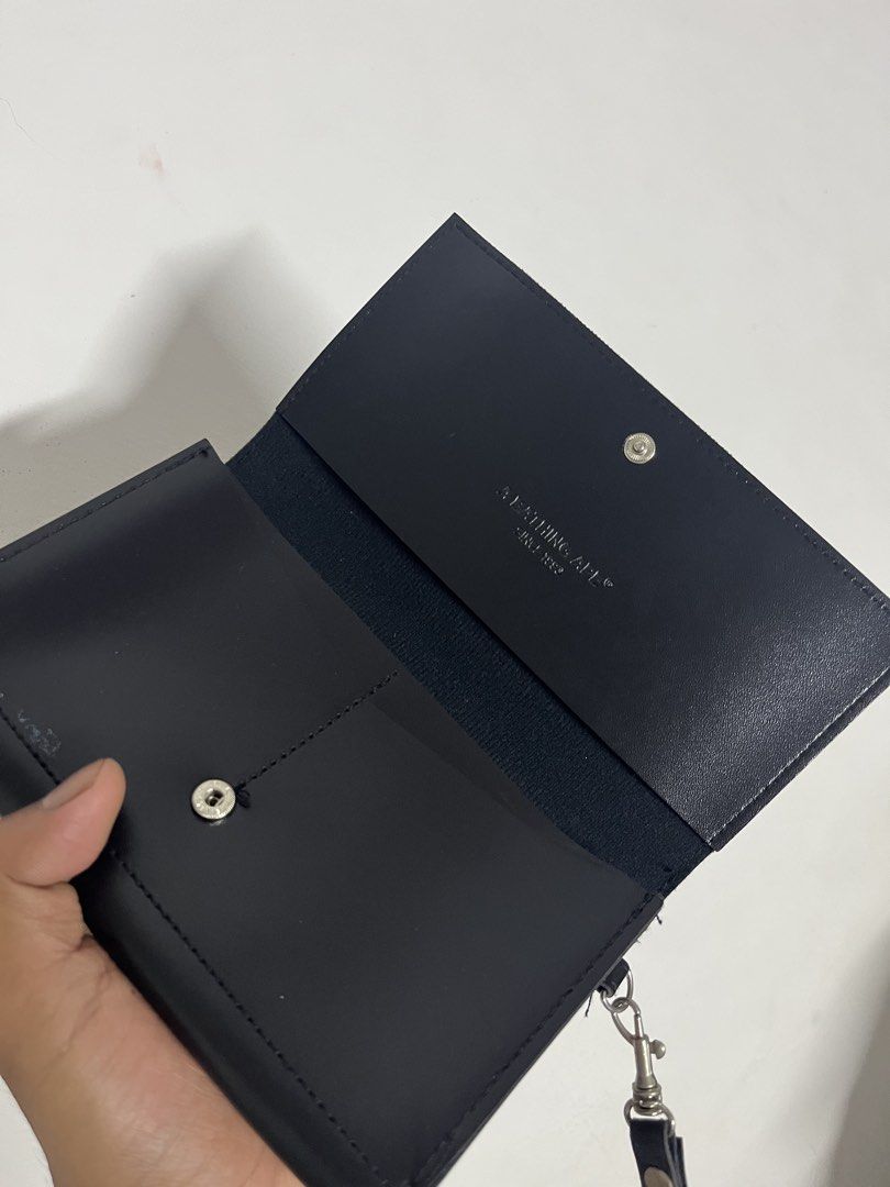 A BATHING APE Leather Multi-Case Black (Category: Luxury Bags & Wallets) located in Manila. Submitted by merryjoyan39637 (Listing ID 1466701315, Image 2). Description: .