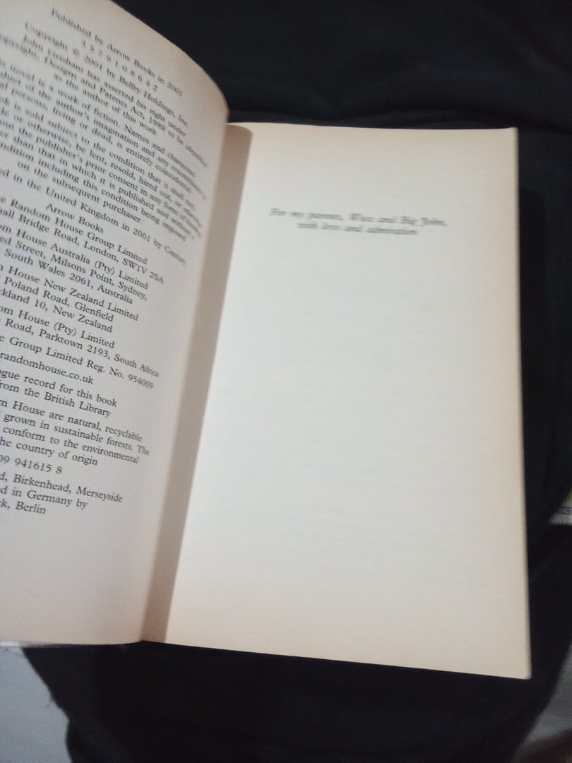 A Painted House by John Grisham Paperback Novel (Category: Storybooks) located in Pasig City. Submitted by teebeedeee (Listing ID 1466566284, Image 3). Description: - Title & Author: A Painted House by John Grisham - Edition & Publisher: Arrow Books, 2001 Paperback - ISBN: 0-09-941615-8 - Setting: Arkansas, September 1952 (follows 7-year-old Luke Chandler) - Condition: Pages have moderate yellowing from age, cover has light shelf wear at edges, s
