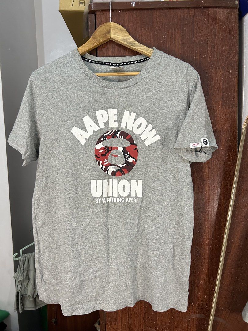 Aape By A Bathing Ape Grey T-Shirt (Category: Tshirts & Polo Shirts ) located in Davao. Submitted by ruggedthrift444 (Listing ID 1466681533, Image 1). Description: excellent condition size med.