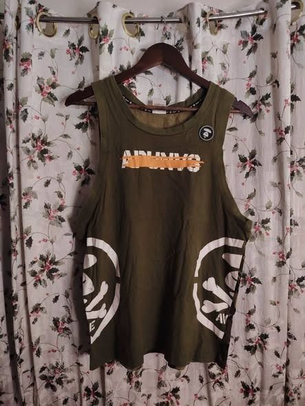 AAPE CAMOU AOP BACK TANKTOP // Large (Category: Activewear) located in Legazpi City. Submitted by urbangarmentsarch4500 (Listing ID 1466704198, Image 2). Description: AAPE CAMOU AOP BACK TANKTOP Excellent Condition Large W 21 L 28 Color rate 9.8/10 1 minimal stain sa print(Check last pic) GRAB 750 (Automatically YOURS)⛓️ --- ‼️w/ FREE STICKERS FOR EVERY PURCHASE⁉️ 🛒🛒🛒 BUY. SELL. TRADE. CONSIGN🗣️🤝🏼 BLESS THY HUSTLE! 🧿✨.