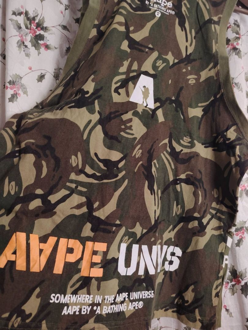 AAPE CAMOU AOP BACK TANKTOP // Large (Category: Activewear) located in Legazpi City. Submitted by urbangarmentsarch4500 (Listing ID 1466704198, Image 3). Description: AAPE CAMOU AOP BACK TANKTOP Excellent Condition Large W 21 L 28 Color rate 9.8/10 1 minimal stain sa print(Check last pic) GRAB 750 (Automatically YOURS)⛓️ --- ‼️w/ FREE STICKERS FOR EVERY PURCHASE⁉️ 🛒🛒🛒 BUY. SELL. TRADE. CONSIGN🗣️🤝🏼 BLESS THY HUSTLE! 🧿✨.
