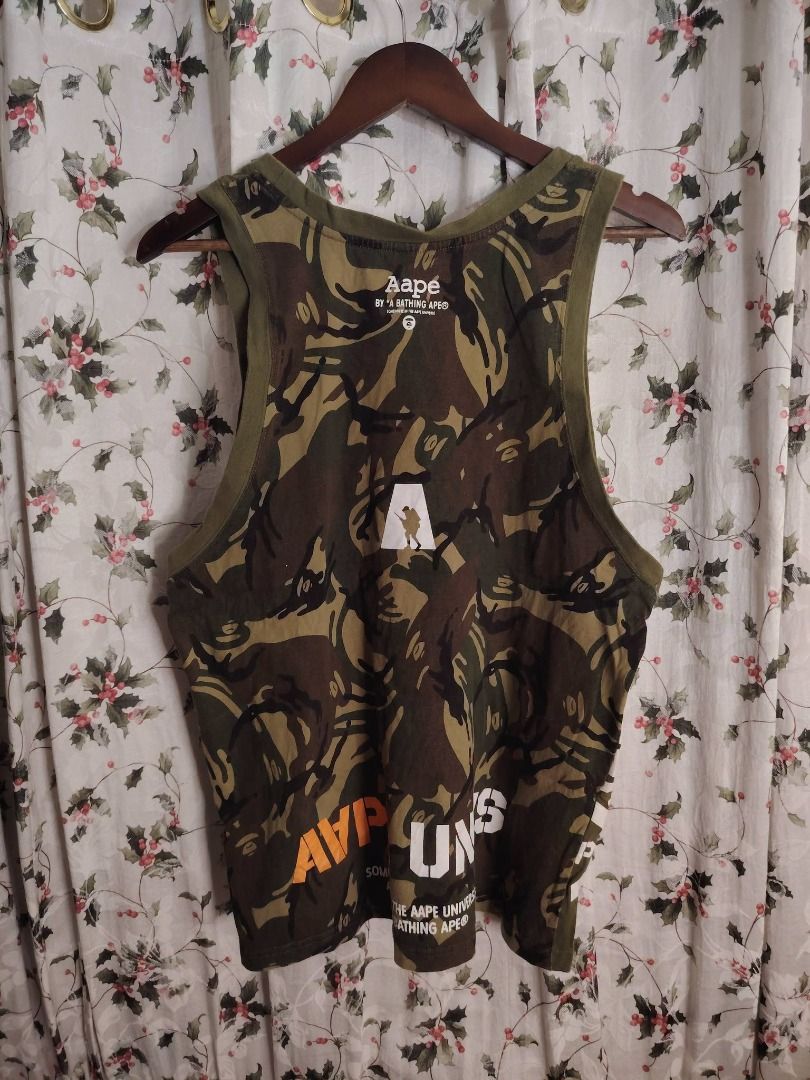 AAPE CAMOU AOP BACK TANKTOP // Large (Category: Activewear) located in Legazpi City. Submitted by urbangarmentsarch4500 (Listing ID 1466704198, Image 1). Description: AAPE CAMOU AOP BACK TANKTOP Excellent Condition Large W 21 L 28 Color rate 9.8/10 1 minimal stain sa print(Check last pic) GRAB 750 (Automatically YOURS)⛓️ --- ‼️w/ FREE STICKERS FOR EVERY PURCHASE⁉️ 🛒🛒🛒 BUY. SELL. TRADE. CONSIGN🗣️🤝🏼 BLESS THY HUSTLE! 🧿✨.