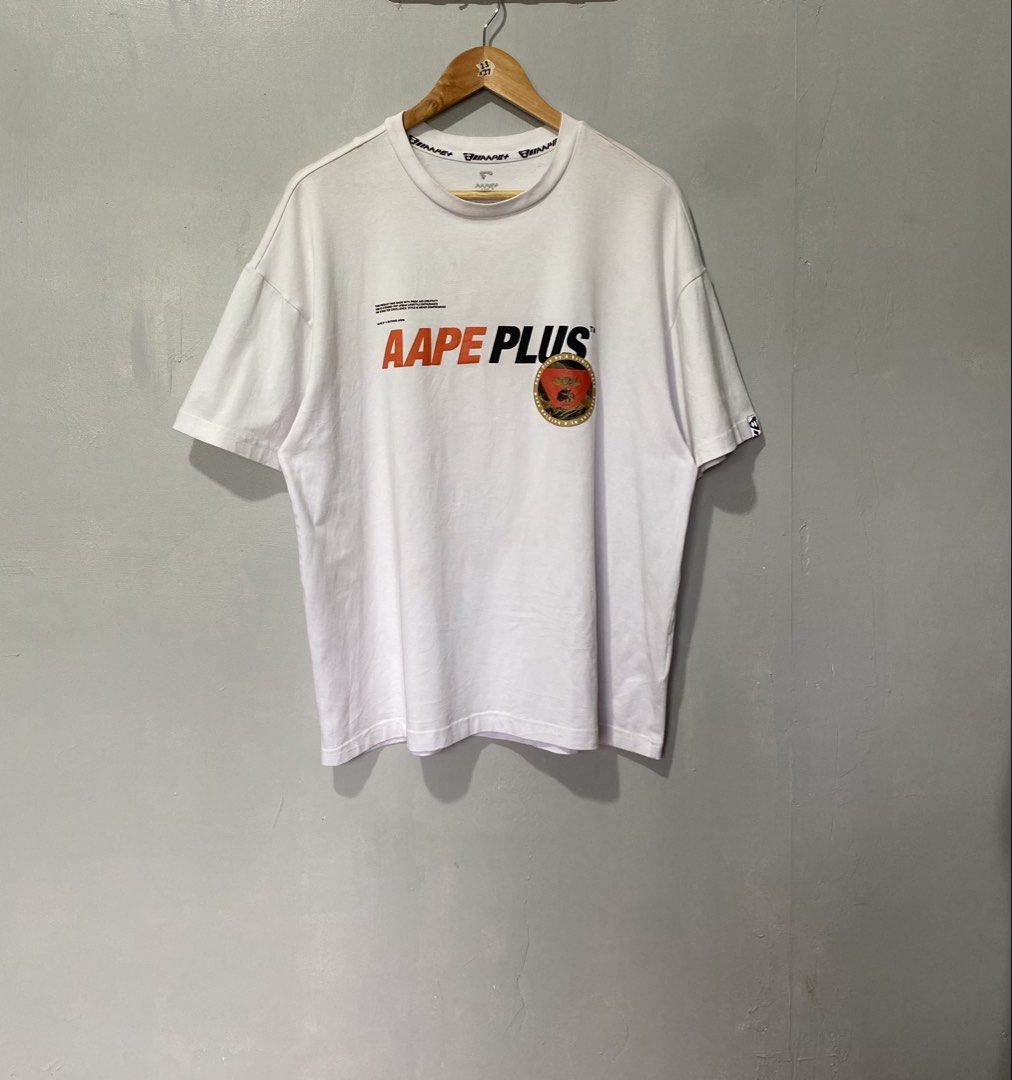 AAPE MOONFACE (Category: Tshirts & Polo Shirts ) located in Quezon City. Submitted by fast_break (Listing ID 1466705183, Image 3). Description: AAPE MOONFACE COLOR: WHITE SIZE: L ON TAG DIMES: W23 x 27L📏 COLOR RATE:9.8/10 EXCELLENT CONDITION AS NEW ✅ NO ISSUE LOC:NOVA QC📍 DM TO PURCHASE 💌.