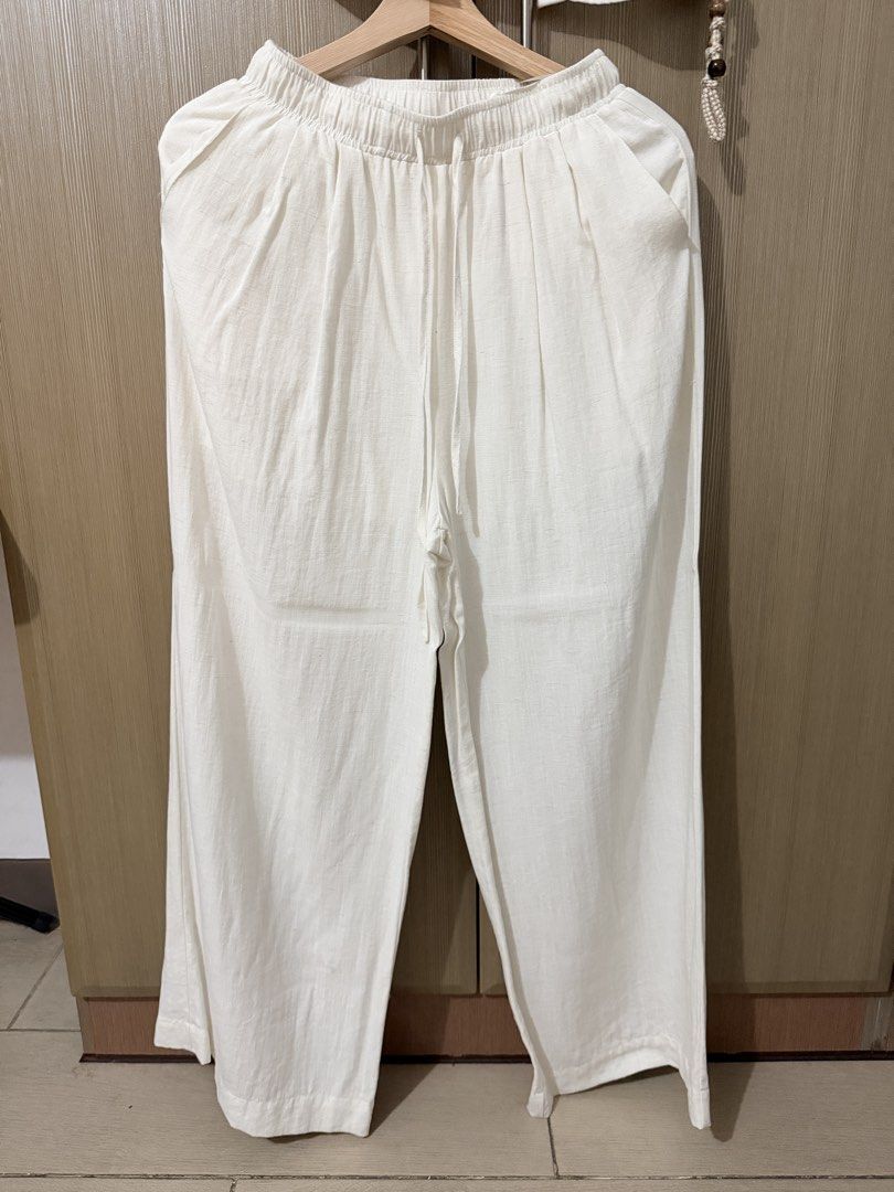 A.C.E Made In Korea Top And Pants Set (Category: Sets or Coordinates) located in Taguig. Submitted by mengxir20193848 (Listing ID 1466672913, Image 2). Description: - Brand: A.C.E (Made in Korea) - Set includes: Matching short-sleeve button-down shirt and wide-leg pants - Shirt features: Chest pockets and adjustable waist cord - Pants features: Elastic drawstring waistband and side pockets - Material: Light, breezy fabric perfect for warm weather
