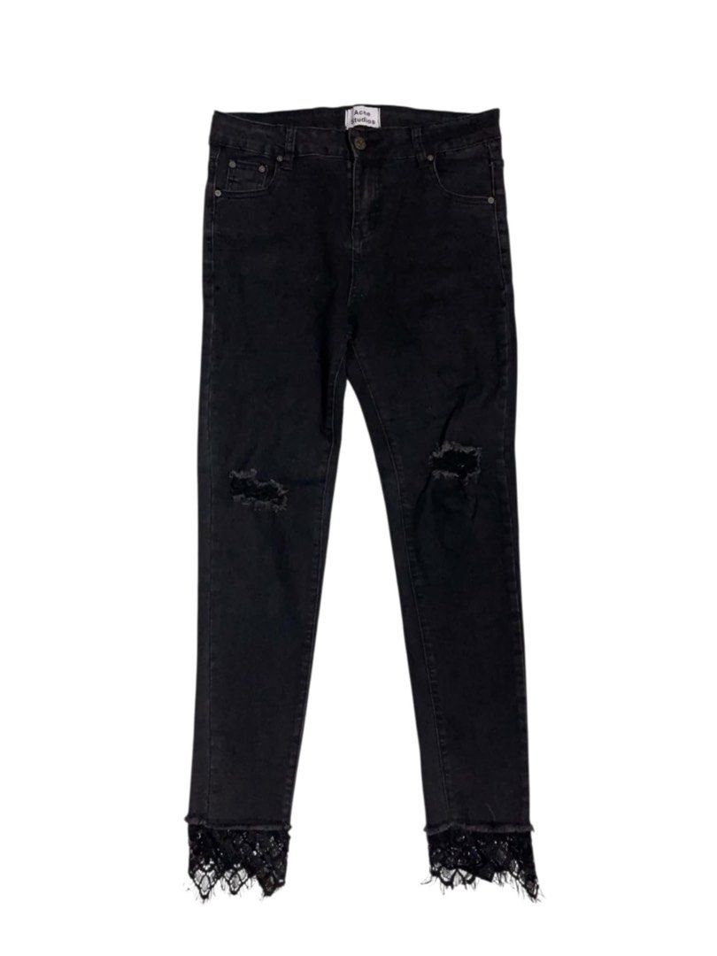 Acne Studios Skin 5 Used Black Jeans (Category: Jeans) located in Manila. Submitted by fastforest_65f95b (Listing ID 1466726608, Image 1). Description: - Brand: Acne Studios - Style: Skin 5 (Mid-rise, button and zip fly) - Material: 92% cotton, 5% polyester, 3% elastane - Country of Origin: Albania - Details: Distressed knees with ripped detailing and a unique lace trim hem at the ankles.