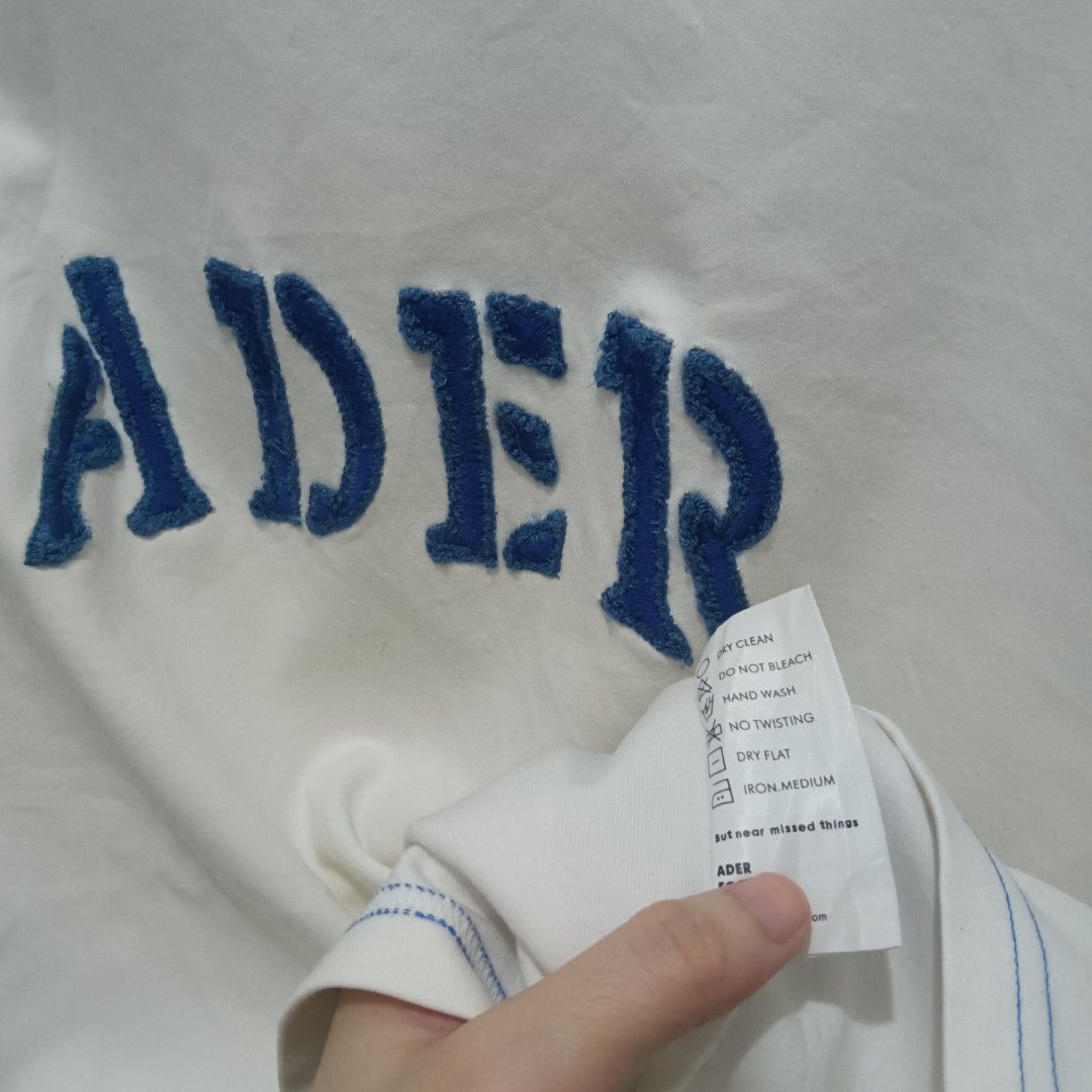 ADER ERROR Embroidered Logo Shirt (Category: Tshirts & Polo Shirts ) located in Caloocan City. Submitted by jaychingsss (Listing ID 1466628374, Image 3). Description: Ader Error Embroidered Logo Shirt - 250 23x28 Heavy Cotton Complete Tags No issue NEED WASH.