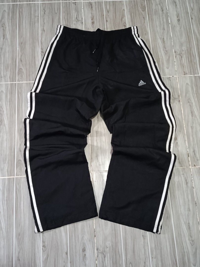 ADIDAS 3LINES NYLON ESSENTIALS JOGGING PANTS (freeshipping) (Category: Activewear) located in Quezon City. Submitted by gyl-stop (Listing ID 1466723689, Image 1). Description: free shipping 30-35 x 41 excellent condi cr: 9.8/10 issue: none.