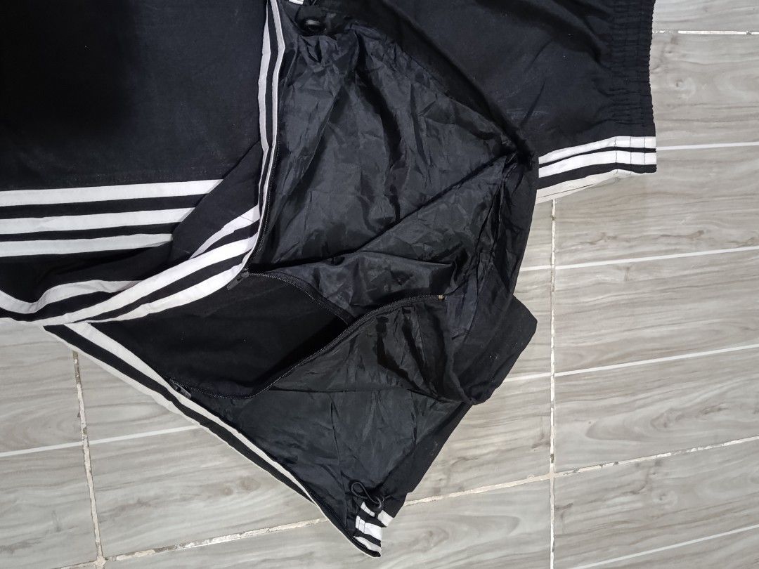 ADIDAS 3LINES NYLON ESSENTIALS JOGGING PANTS (freeshipping) (Category: Activewear) located in Quezon City. Submitted by gyl-stop (Listing ID 1466723689, Image 3). Description: free shipping 30-35 x 41 excellent condi cr: 9.8/10 issue: none.