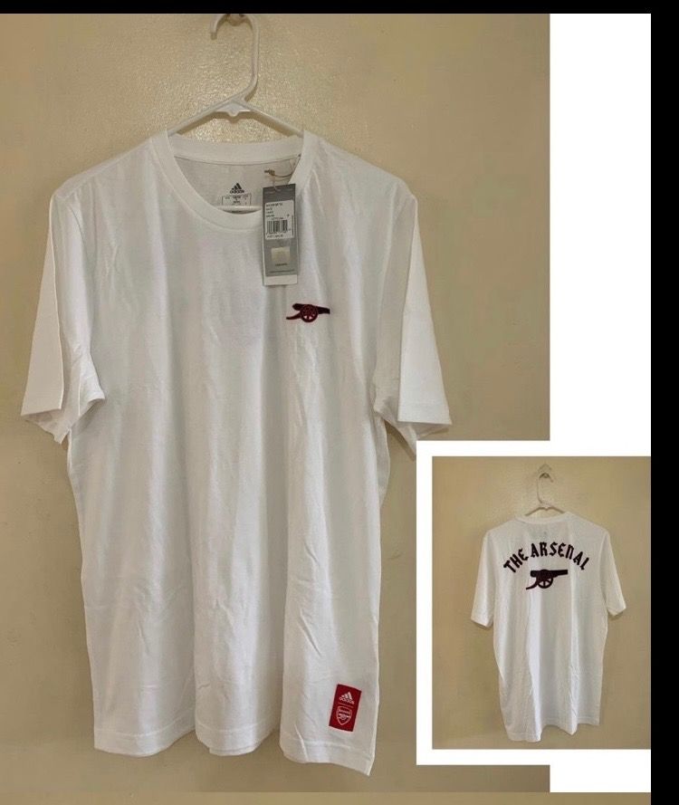 Adidas Arsenal Tshirt Unisex (Category: Tshirts & Polo Shirts ) located in Valenzuela. Submitted by clickandshoppreloved (Listing ID 1466624499, Image 1). Description: Adidas Arsenal Tshirt Mens SRP 1500 Sale Price 799 Onhand, Original Brandnew Medium Ontag, (29L x 21M) Color : White.