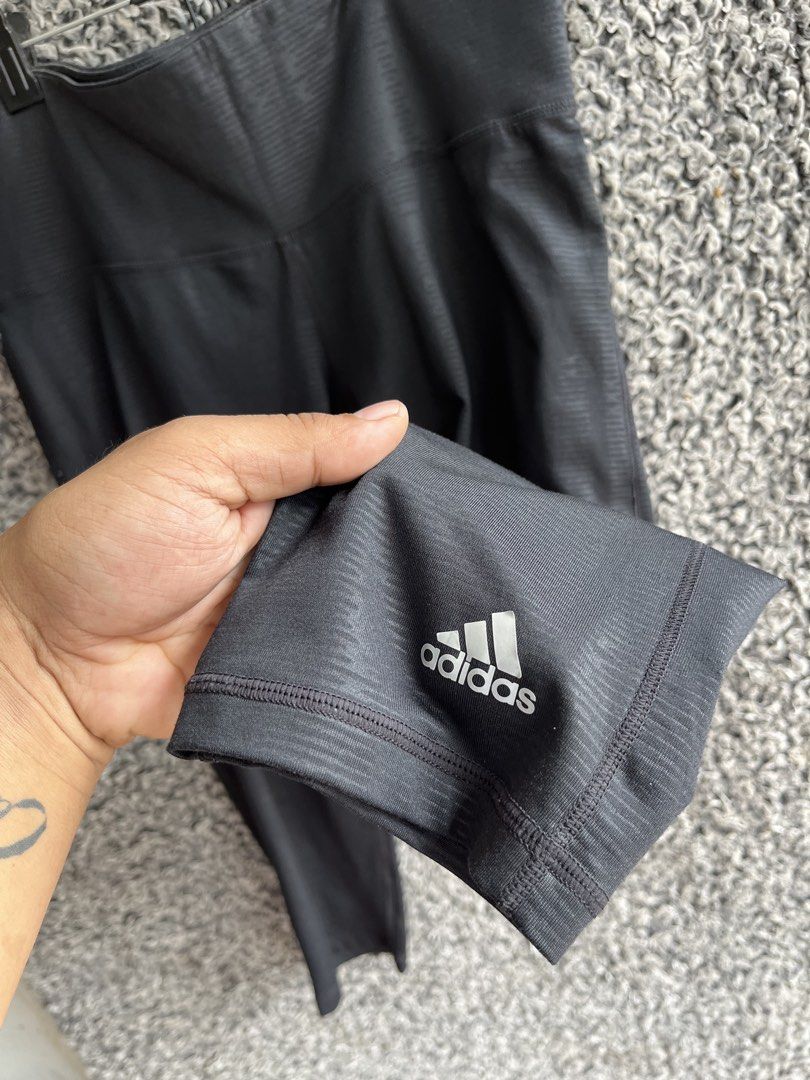 Adidas athletic leggings | Size M (Category: Activewear) located in General Trias. Submitted by zrchustle.604 (Listing ID 1466595605, Image 2). Description: Adidas athletic leggings feature a textured ribbed pattern and a small white Adidas logo near the left hem..