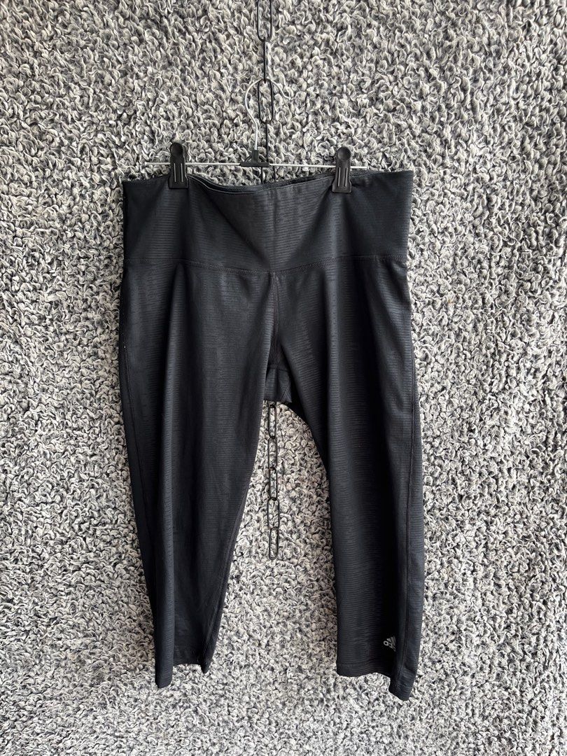 Adidas athletic leggings | Size M (Category: Activewear) located in General Trias. Submitted by zrchustle.604 (Listing ID 1466595605, Image 1). Description: Adidas athletic leggings feature a textured ribbed pattern and a small white Adidas logo near the left hem..