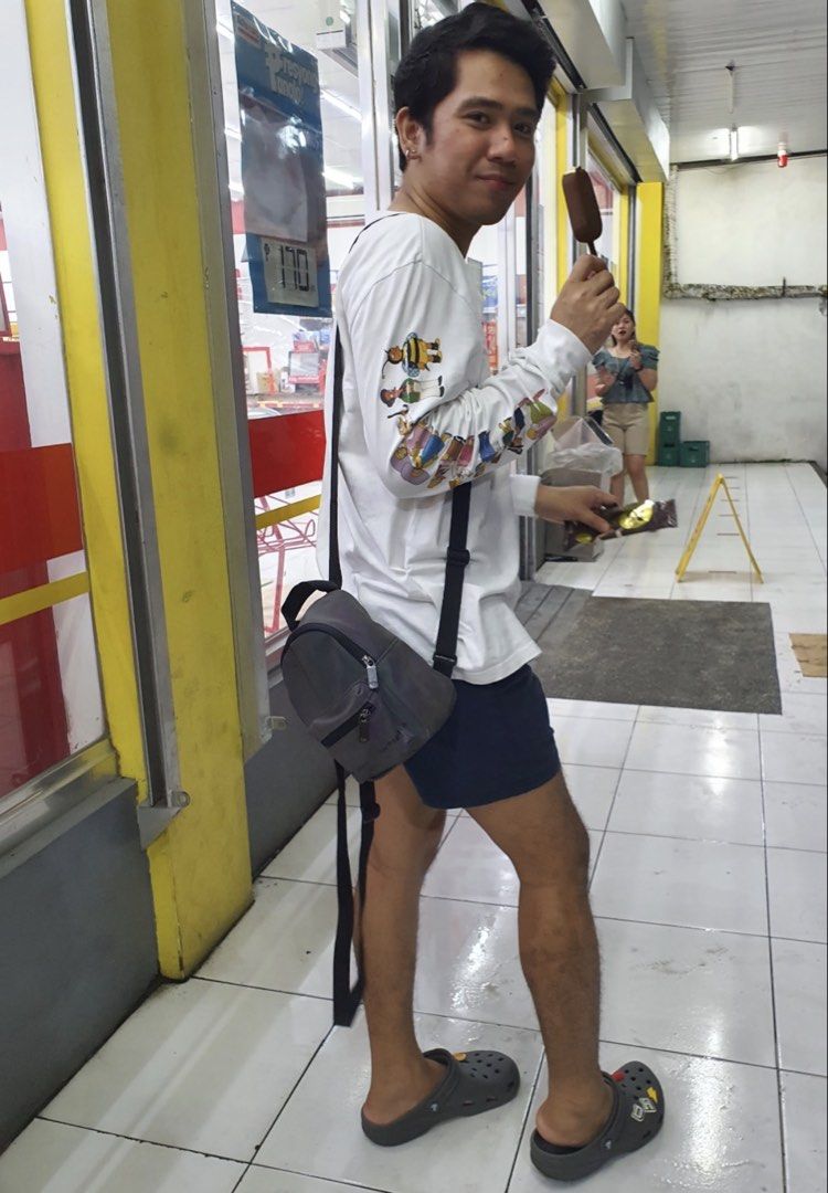 Adidas Holographic Mini Backpack Grey (Category: Backpacks) located in Las Pinas. Submitted by iamdaverybest (Listing ID 1466652590, Image 2). Description: - Brand: Adidas - Style: Mini backpack - Color: Grey holographic (shifts to rainbow colors in the light) - Features: Front zip pocket and adjustable black straps - Size: Compact, perfect for daily essentials - Condition: Used, as seen in photos.