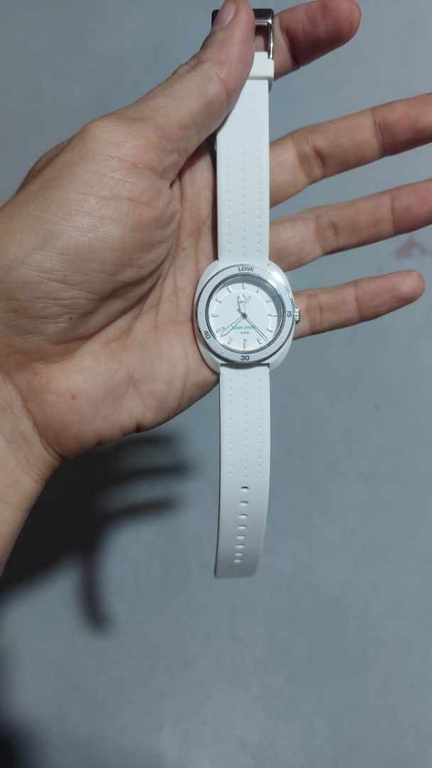 Adidas Stan Smith ADH3122 White Green Watch (Category: Women's Watches) located in Santa Cruz. Submitted by tovybonacruz (Listing ID 1466595234, Image 1). Description: - Model: Adidas Stan Smith ADH3122 - Dial: White with green accents and Stan Smith branding - Strap: White silicone with perforated details and a contrasting green underside - Caseback: Stainless steel with engraved serial number (901701) - Water Resistance: 10 ATM - Condition: Gua