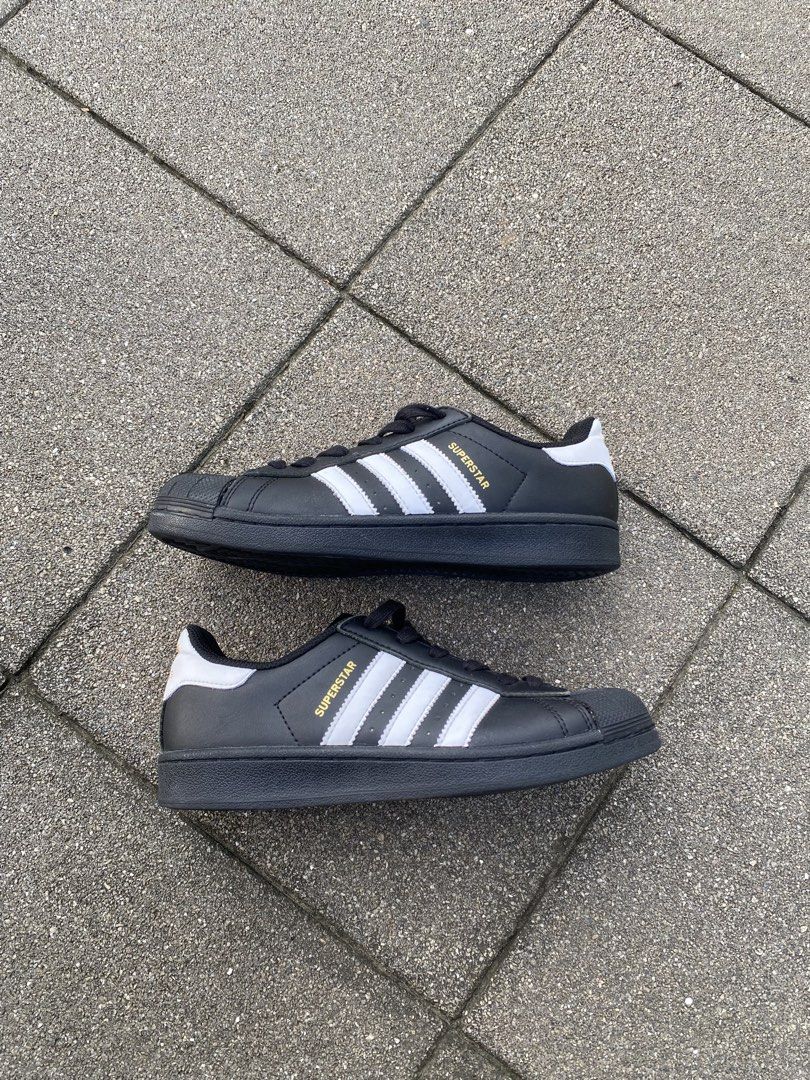 Adidas Superstar Black White Shoes (Category: Sneakers) located in Davao. Submitted by thirdy.pfp (Listing ID 1466654411, Image 1). Description: Adidas Superstar Classics (3) 6 us / 24 cm Excellent 9/10 -1300 - Brand/Model: Adidas Superstar - Colorway: Classic Black and White - Design: Iconic shell toe, signature three stripes, and white heel tab - Branding: Premium gold branding on the tongue and side, plus a gold trefoil logo on the heel - Cond