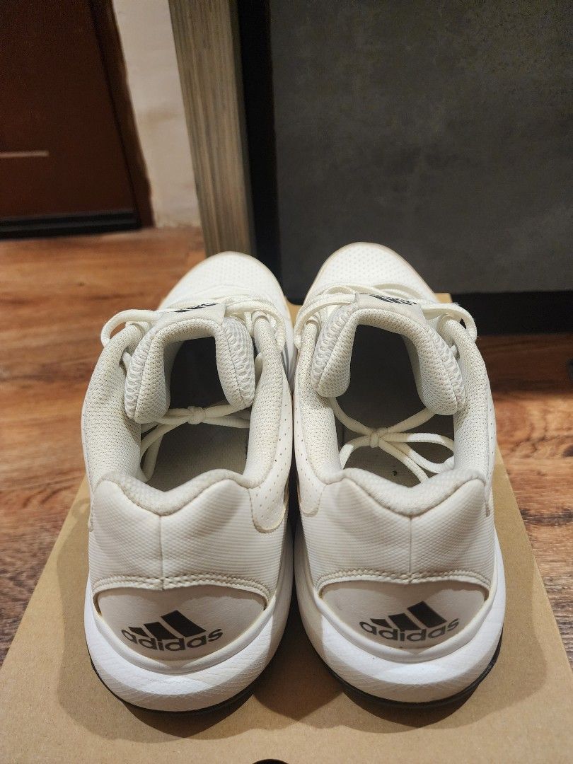 Adidas White Black Sneakers US 10.5 (Category: Sneakers) located in Manila. Submitted by kg613 (Listing ID 1466773352, Image 3). Description: - Brand: Adidas - Color: White with black stripes - Size: US 10.5 / UK 10 / FR 44 / JP 280 - Features: Perforated toe box, lace-up closure, breathable mesh tongue - Condition: Good, with minor yellowing on the laces from storage - Inclusions: Original brown shoebox included.