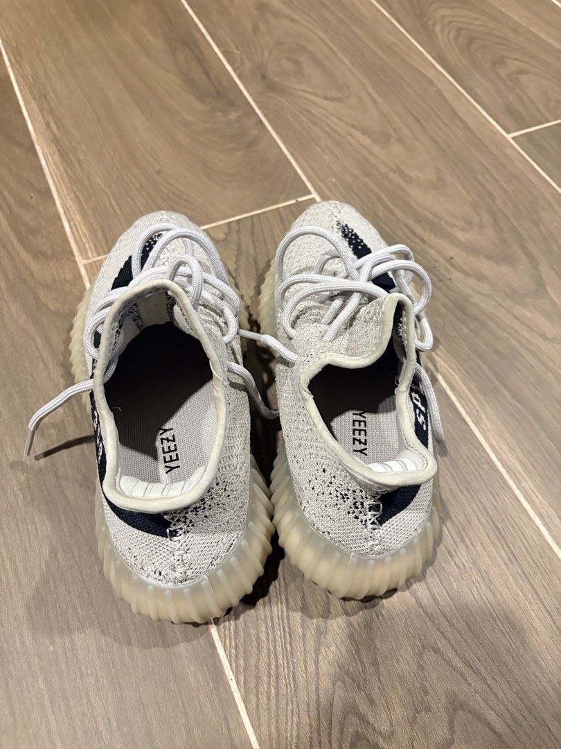 Adidas Yeezy Boost 350 V2 Reverse Oreo (Category: Sneakers) located in Dasmarinas. Submitted by the_zoneshop.ph (Listing ID 1466738138, Image 3). Description: - Model: Adidas Yeezy Boost 350 V2 (Slate / Core Black) - Upper: Primeknit material with signature SPLY-350 side stripe - Comfort: Translucent rubber midsole with responsive Boost cushioning - Used once - Size US5 - Perfect daily kicks to elevate your sneaker rotation.