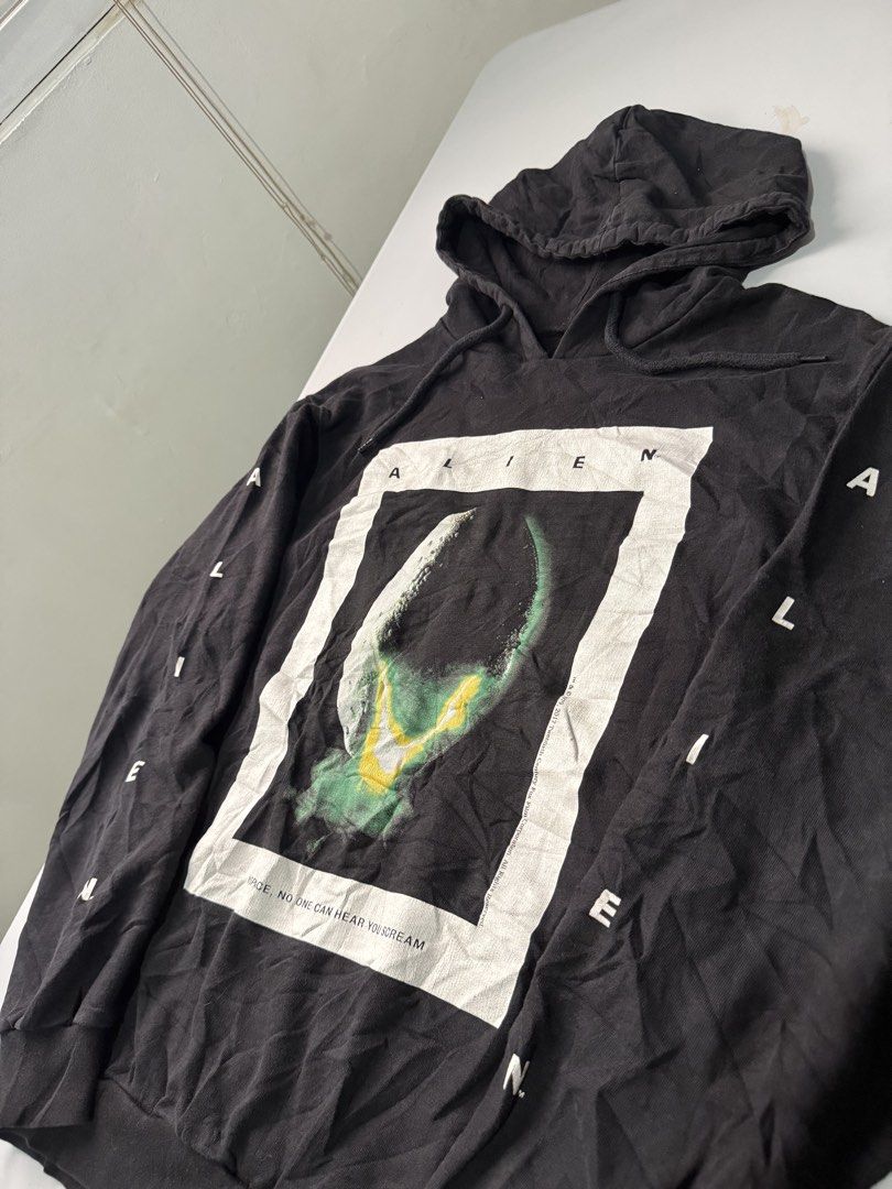 ALIEN HOODIE (Category: Coats, Jackets and Outerwear) located in Manila. Submitted by pricendimes_23 (Listing ID 1466721941, Image 2). Description: ALIEN hoodie by H&M Medium Good condition 9/10 color rate issue: minimal crack prints (need wash).