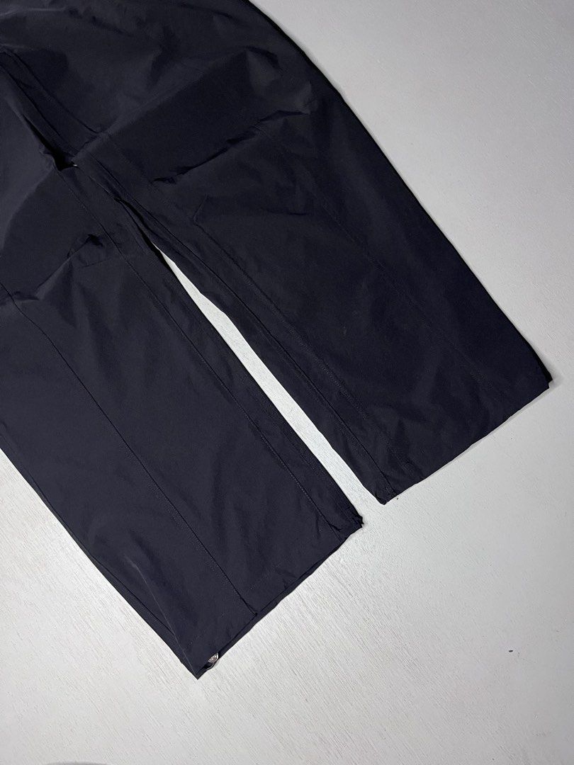Alo Yoga Black Cargo Pants (Category: Jeans) located in Catbalogan. Submitted by yellfindss (Listing ID 1466751787, Image 3). Description: - Brand: Alo Yoga -28-34 adjustable waist / 38 lo 9 - Item: Utility Cargo Pants - Color: Black - Material: Lightweight nylon - Fit: Relaxed wide-leg - Waistband: Drawstring with toggle hardware - Pockets: Multiple, including side cargo compartments - Cuffs: Adjustable drawstrings with metal stoppers - Branding