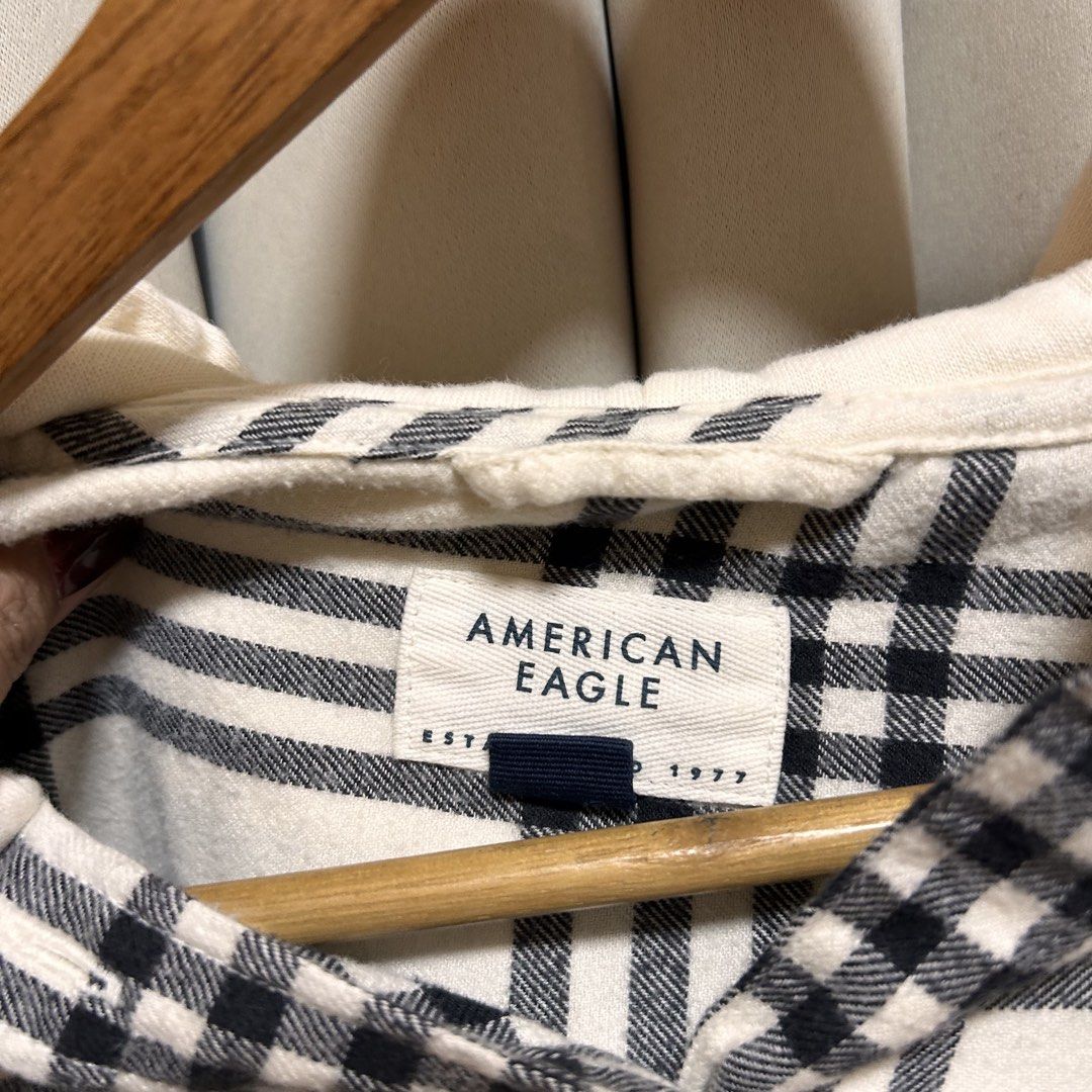 American Eagle Black White Plaid Hooded Flannel Jacket (Category: Coats, Jackets and Outerwear) located in Rizal. Submitted by from99abovecloset (Listing ID 1466565488, Image 2). Description: CODE:138 Size: medium to large Armhole (laid flat):9” Bust (around): 46” Length (laid flat): 29” Cotton | loose | like new .