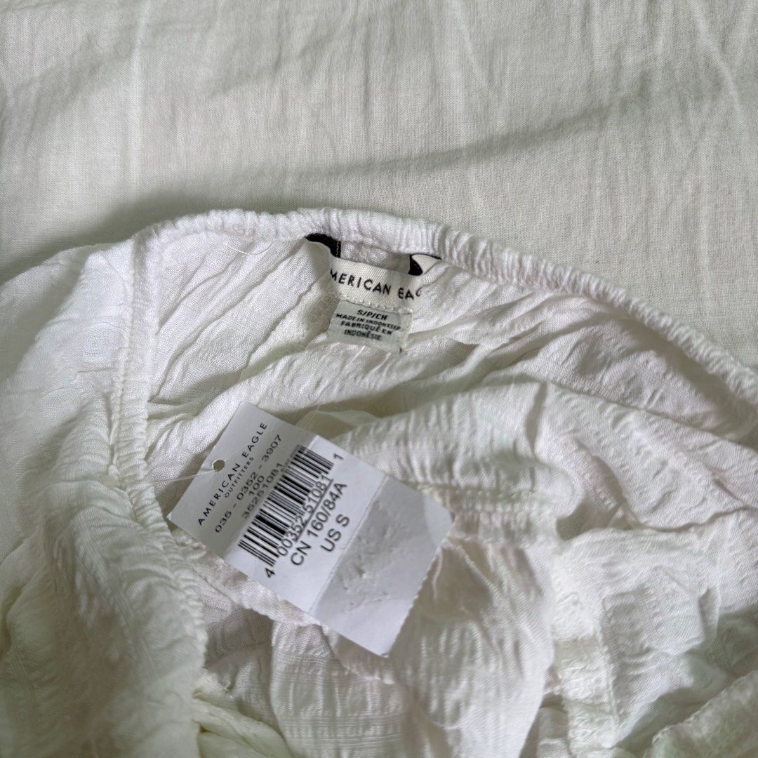 American Eagle tie top (Category: Sleeveless) located in Manila. Submitted by shesells3ashells (Listing ID 1466608345, Image 3). Description: still with tags very cute backless tie detail.