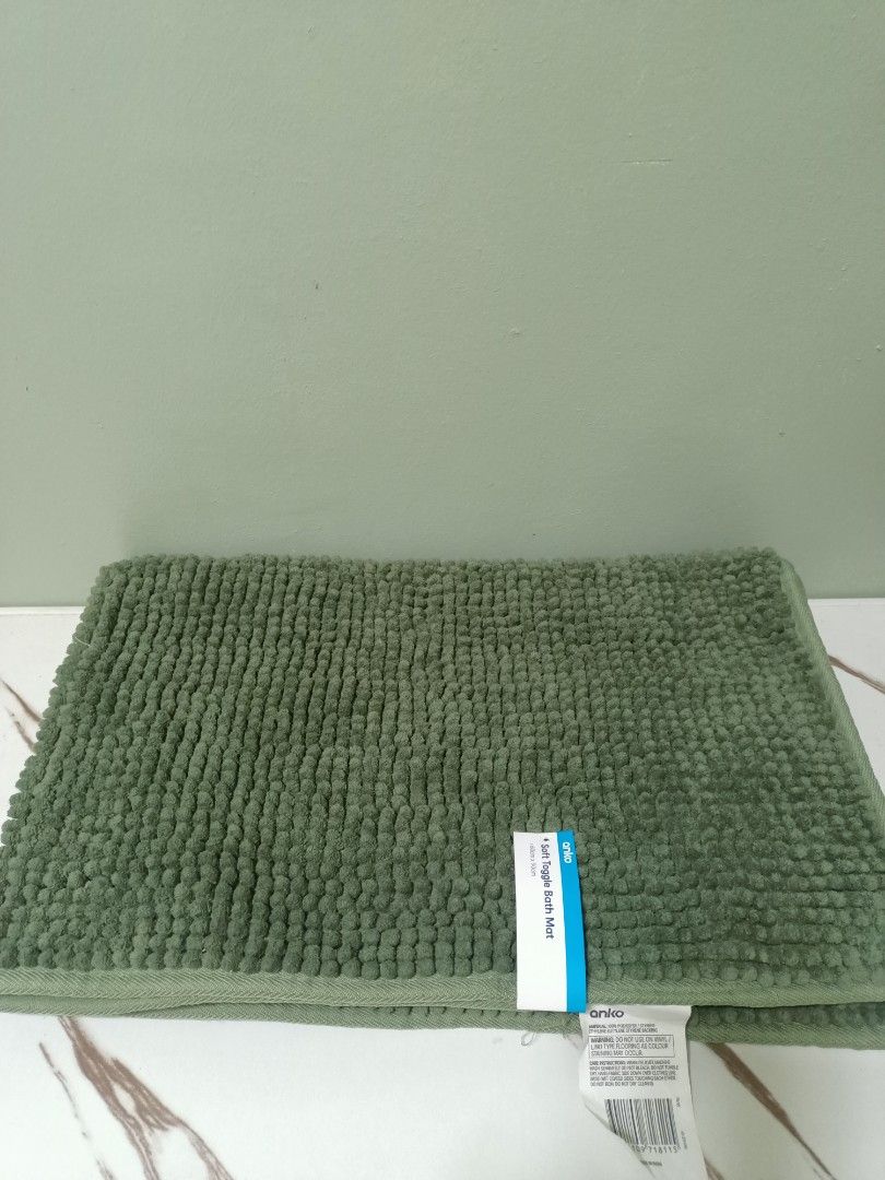 Anko Soft Toggle Bath Mat Green (Category: Bathtub & Bath Accessories) located in Antipolo. Submitted by cathrift_ (Listing ID 1466724145, Image 1). Description: - Brand: Anko - Color: Earthy green - Size: 60cm x 90cm - Material: Polyester and synthetic - Condition: Brand new with original tags attached - Features: Soft toggle texture - Care: Machine washable.