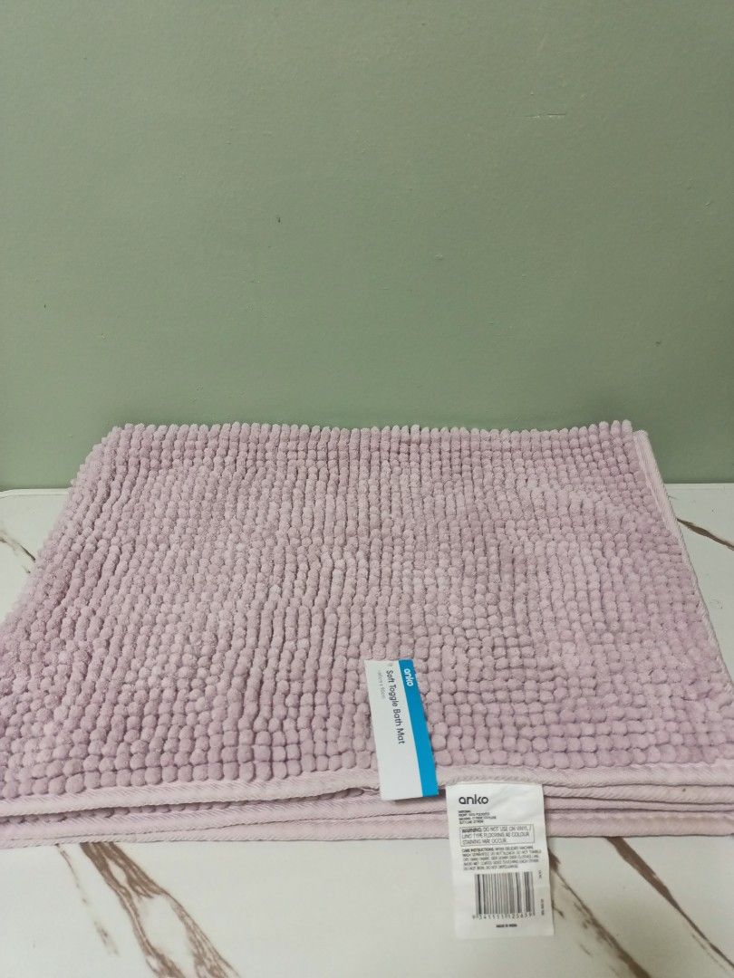 Anko Soft Toggle Bath Mat Pink (Category: Bathtub & Bath Accessories) located in Antipolo. Submitted by cathrift_ (Listing ID 1466724031, Image 1). Description: - Brand: Anko - Color: Pink - Size: 60cm x 90cm - Condition: Brand new with original store tags attached, never used - Material/Texture: Plush textured surface that is soft underfoot and absorbs water well - Care: Machine washable (follow care label instructions) - Perfect for adding a co