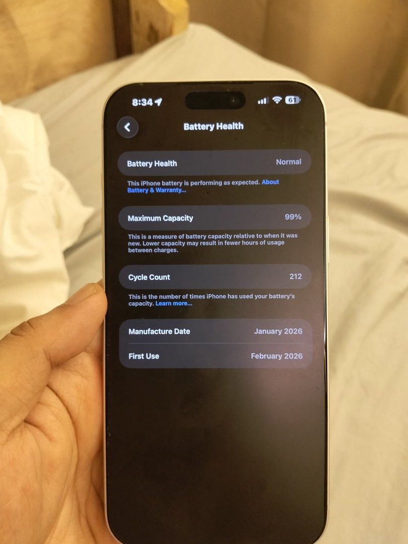 Apple iPhone 256GB Silver (Category: iPhone 17 Series) located in Quezon City. Submitted by quickflower_81f052 (Listing ID 1466566232, Image 3). Description: - Model: Silver with 256GB storage - Battery Health: 99% (212 cycle counts) - Display: Standard Dynamic Island cutout - Camera: Triple rear camera setup - Condition: Clean body, fully functional daily driver - still in warranty - Reason for selling: Upgrading soon Inclusion : Charger and Box