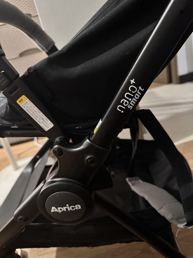 Aprica Stroller for Newborn to Toddler (Category: Strollers) located in Bacoor. Submitted by glairaval56339 (Listing ID 1466705411, Image 3). Description: - Model: Aprica Nano Smart Plus - Color: Black and grey with a stylish patterned canopy - Portability: Compact, lightweight fold (ideal for travel and public transit) - Safety & Comfort: Includes padded harness straps and a safety bumper bar - Mobility: Wheels roll smoothly - Condition: Clean f
