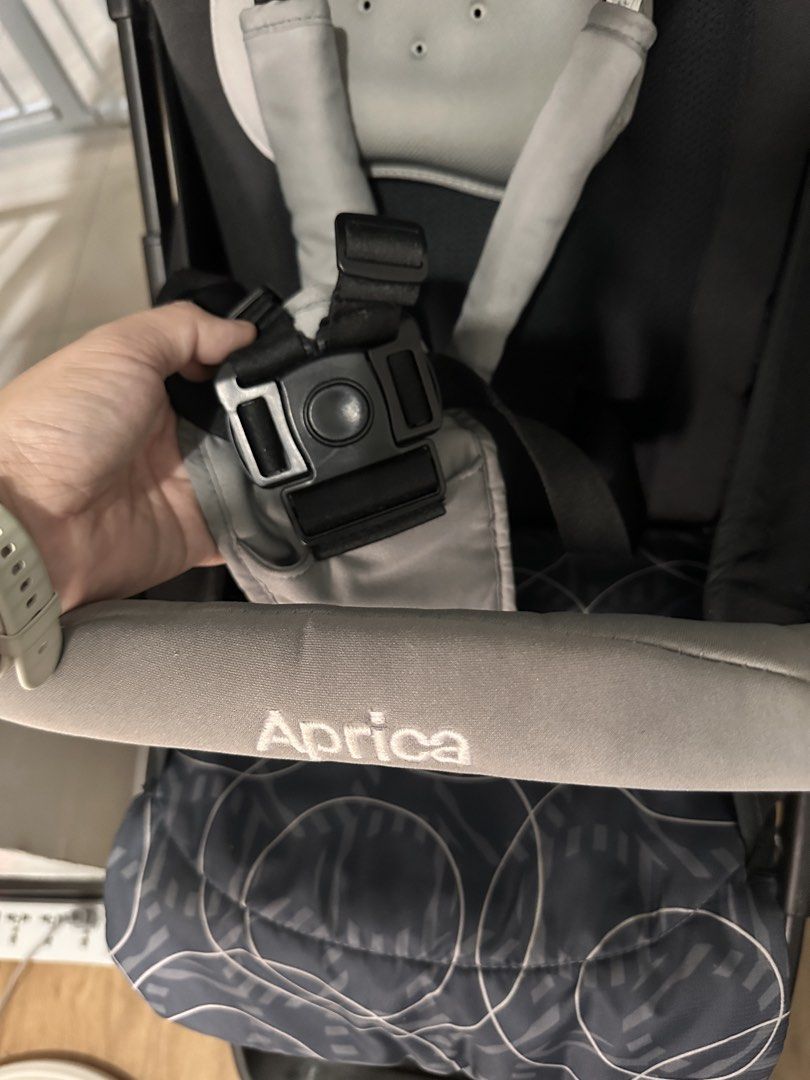 Aprica Stroller for Newborn to Toddler (Category: Strollers) located in Bacoor. Submitted by glairaval56339 (Listing ID 1466705411, Image 2). Description: - Model: Aprica Nano Smart Plus - Color: Black and grey with a stylish patterned canopy - Portability: Compact, lightweight fold (ideal for travel and public transit) - Safety & Comfort: Includes padded harness straps and a safety bumper bar - Mobility: Wheels roll smoothly - Condition: Clean f