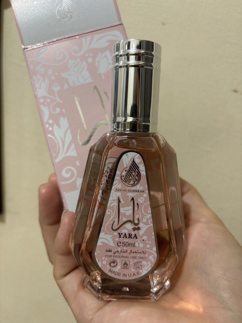 Ard Al Zaafaran Yara Perfume 50ml (Category: Fragrance & Deodorants) located in Balayan. Submitted by authenticfindsbymrb (Listing ID 1466712012, Image 3). Description: - Authentic Ard Al Zaafaran Yara Perfume (50ml) - Made in U.A.E. - Condition: Brand new, full bottle, unused - Comes in original pink floral box packaging - Features a spray nozzle with a sleek silver cap - For external use only.