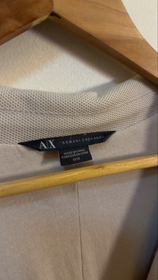 Armani Beige Summer Blazer Jacket (Category: Coats, Jackets and Outerwear) located in Paranaque City. Submitted by preluxeshop_ph (Listing ID 1466765348, Image 3). Description: Armani Beige Summer Blazer Jacket -Classic button up style -Condition: 9.8/10 -Dimes: Length: 29” Width: 20”.