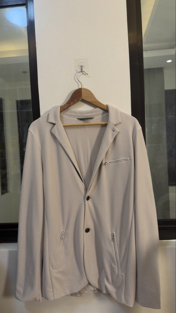 Armani Beige Summer Blazer Jacket (Category: Coats, Jackets and Outerwear) located in Paranaque City. Submitted by preluxeshop_ph (Listing ID 1466765348, Image 2). Description: Armani Beige Summer Blazer Jacket -Classic button up style -Condition: 9.8/10 -Dimes: Length: 29” Width: 20”.