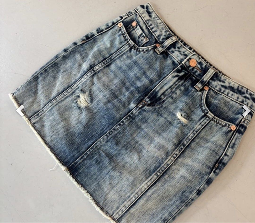 Armani Exchange (A|X) Distressed Denim Mini Skirt (Category: Skirts) located in Davao. Submitted by theresetshelf (Listing ID 1466721930, Image 1). Description: • Authentic Armani Exchange (A|X) • Beautiful light-to-medium vintage wash denim • Features vertical panel seams, subtle distressing, and a trendy frayed raw hem • Very well maintained, no stains or flaws! 📏 PM for measurements / questions. .