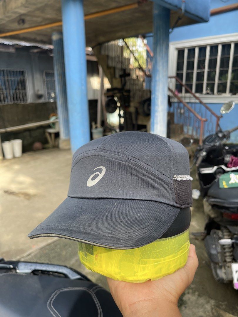 Asics 5 panel running cap (Category: Caps & Hats) located in Butuan. Submitted by cgsayas20083001 (Listing ID 1466645652, Image 2). Description: See pic issue done wash.