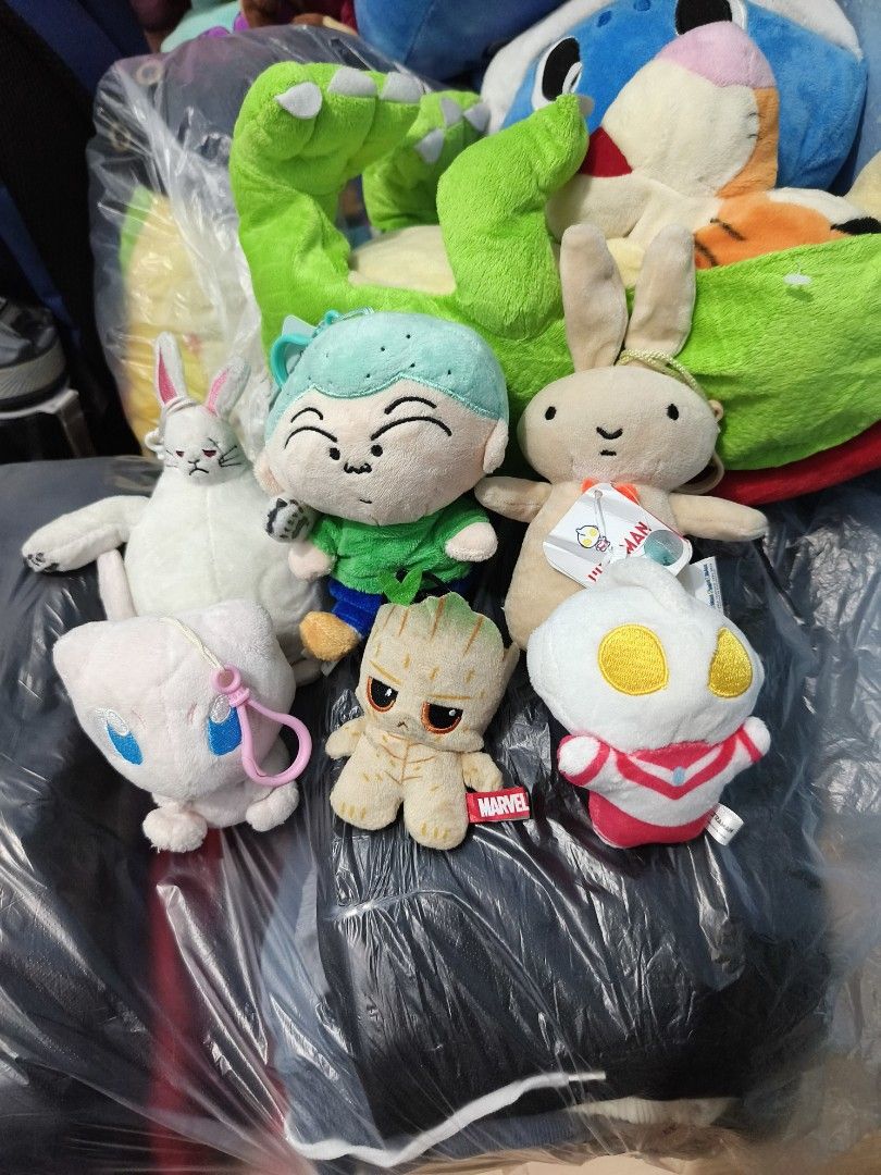 Assorted Anime and Character Plush Toys Set (Category: Plushies & Soft Toys) located in Iligan City. Submitted by sneakymagician (Listing ID 1466708936, Image 2). Description: - Assorted plush toys available as a set or individually - Collection includes: Marvel Groot (with tag)- (SOLD) , Ultraman characters, Pokemon Mew keychain, funny white bunny(ONE-PIECE) , green-haired cartoon character, and a beige rabbit with an orange bow - Condition: Bra