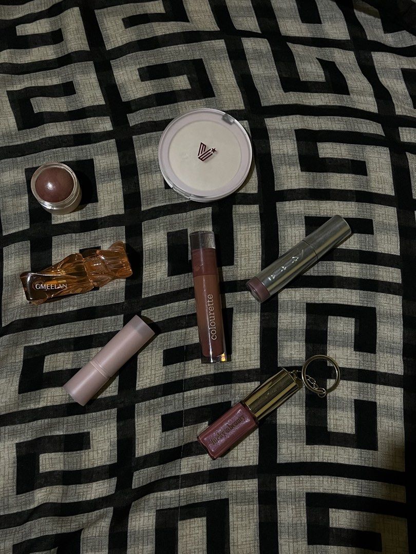 Assorted Makeup Bundle Colourette Gmeelan Lucky Beauty (Category: Makeup) located in Legazpi City. Submitted by vastshark.4c0ac7 (Listing ID 1466684959, Image 1). Description: - 7-piece assorted cosmetics bundle (selling as a set) - Includes Colourette liquid lipstick, Gmeelan product, Lucky Beauty lip product with keychain, round powder compact, cream blush pot, and 2 extra lip items - Shades: Assorted pinks, browns, and nudes - Condition: Vanit