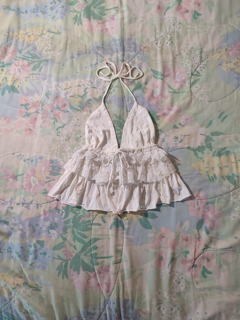 Assorted Y2K Aesthetic Cami and Halter Tops Bundle - 7 items (Category: Sleeveless) located in Jaen. Submitted by roxantiago (Listing ID 1466730565, Image 2). Description: - Wardrobe clearout: Y2K camis and halter tops - Variety of styles: Lace ruffles, beaded waistbands, cowl necks, and sequins - Neutral colors: White, grey, beige, and black - Versatile: Easy to mix and match for casual days or nights out - Purchase options: Sold individually or